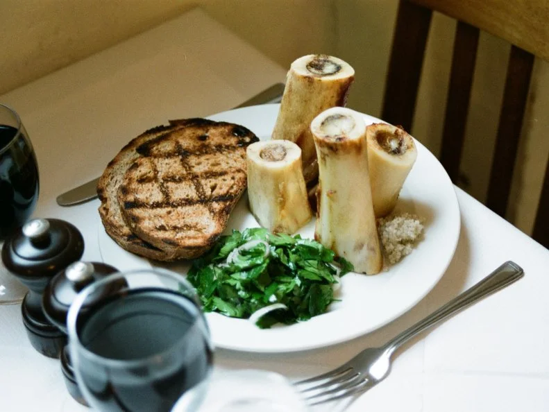 St. John could also be called St. Nose-to-Tail, or, more succinctly: St. Offal. Internal organs aren't the only thing this carnivorous corner of Clerkenwell peddles, but they're definitely one of the key things that made it famous. Chef Fergus Henderson is the son of two architects — one a keen cook, the other a keen eater — so it's easy to explain the architectural fine lines that characterise his eating spaces. If you want a one-dish exemplification of what Henderson is all about, order the unctuous bone marrow and parsley salad.