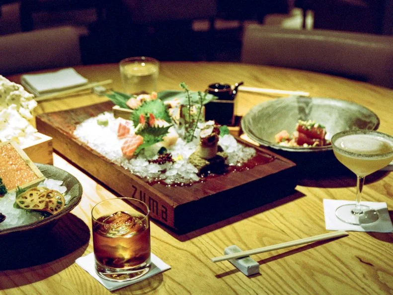 Knightsbridge: home to women with tiny dogs, big hair and even bigger bank accounts. Fitting, then, that Zuma puts a swish spin on casual izakaya-style Japanese dining. Noted Tokyo design firm Super Potato, headed up by Noriyoshi Muramatsu, aced the shark-sleek fit-out: an amber cocoon of caramel-colored wood with soft lighting. Watch the chefs at work in the open kitchen or book the Tosho table for 10. To get the best introduction to the masterful sushi and sashimi, opt for one of the tasting menus and canter from sliced yellowtail with green chile relish, ponzu and pickled garlic to marinated black cod wrapped in hoba leaf. Zumba's bar has around 40 sakes, for those looking to up the ante.