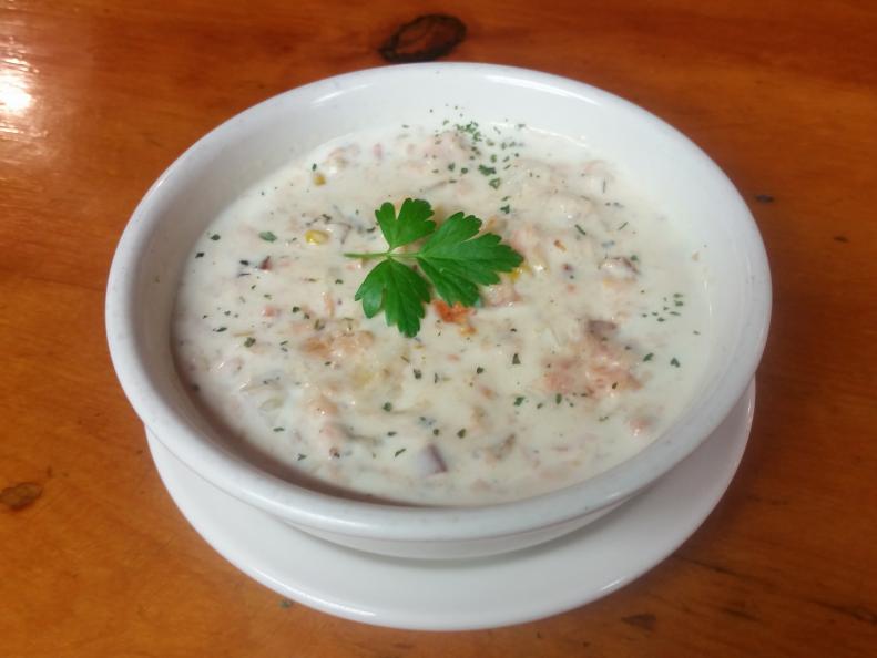 Manhattan and New England can keep their clam-based chowders. In Alaska, chowder is studded with smoked salmon. After a hard day of fishing or hiking on the Kenai Peninsula, Gwin’s Lodge in Cooper Landing offers just the bowl. A full bar, plus hearty fare like burgers, sandwiches, chili, and pies, will have you back out playing in no time. But those in the know order the smoked salmon chowder; the rich, creamy bowl satisfies a hungry belly with utterly Alaskan flavor.