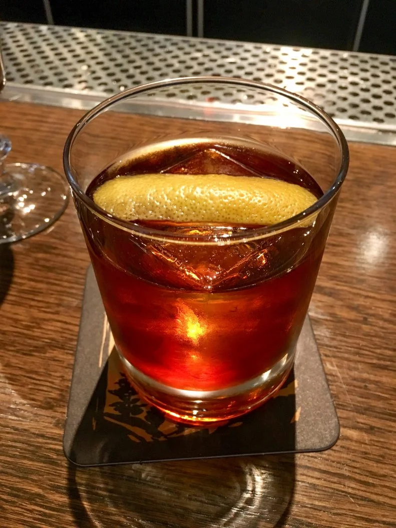 Coffee gets a boozy kick at Headwaters in Portland. Bar Manager Brandy Feit blends rum, amaro and angostura bitters to create what she calls the “perfect playground for coffee and citrus.” To get those kicks, Feit adds Portland Sodaworks Water Avenue Coffee Syrup and a lemon twist as garnish.