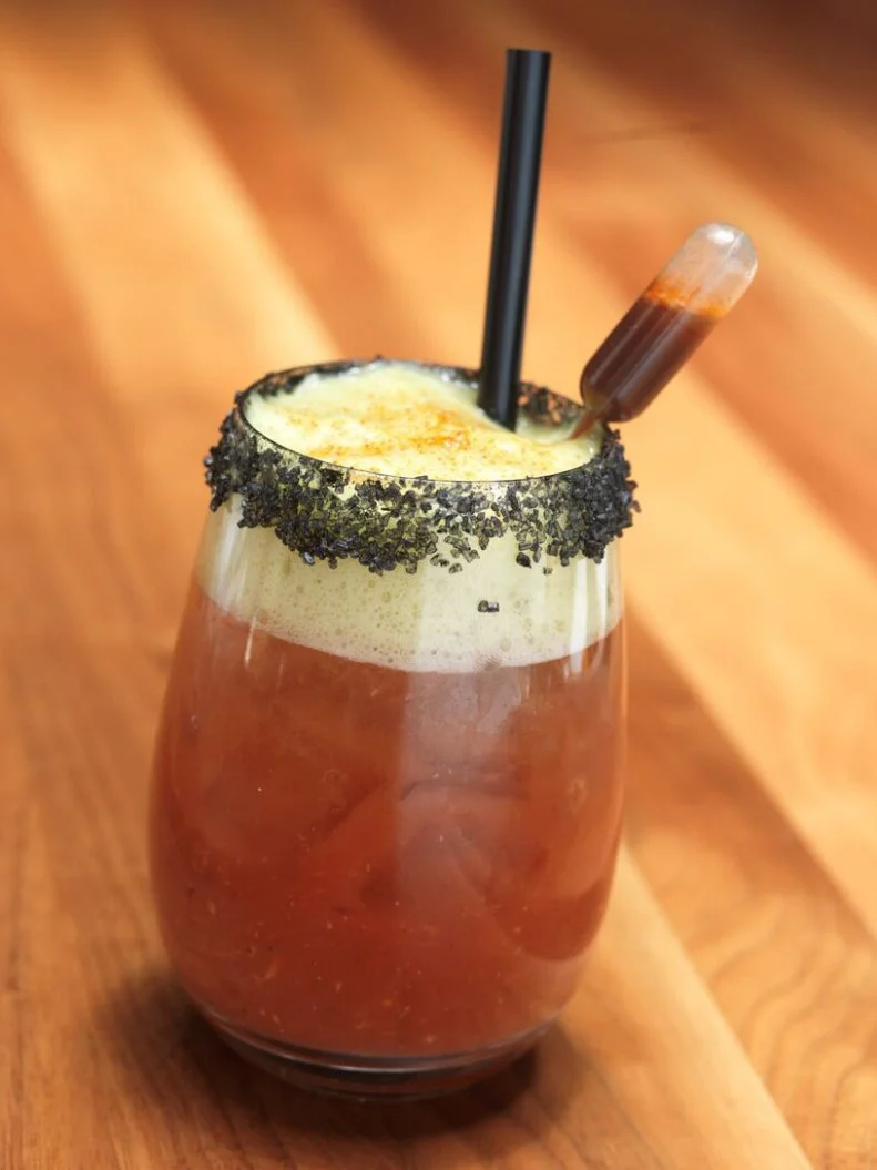 At J&G Grill at The St. Regis Deer Valley, sip on a drink composed of rich history and local booze. The not-so-average Bloody Mary â   named for the resortâ  s elevation â   uses housemade tomato juice mix, local vodka, wasabi and celery foam, all topped with black lava salt that pays homage to the areaâ  s mining history. The pipette of Worcestershire and Tabasco sauces lets guests control the cocktailâ  s spice level.