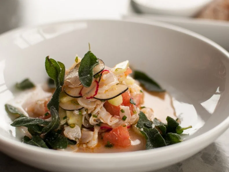 As mega restaurateur Ethan Stowell continues to build his empire at an impressive speed, one of the classic dishes that helped put him on the map isnâ  t going anywhere. At Anchovies & Olives in Seattle, Stowell makes geoduck crudo by thinly slicing the saltwater clamâ  s siphon and mixing it with radishes, fennel and chiles. Itâ  s a simple dish with a refined taste that magically makes you forget all about the hilarity of the geoduckâ  s awkward appearance.