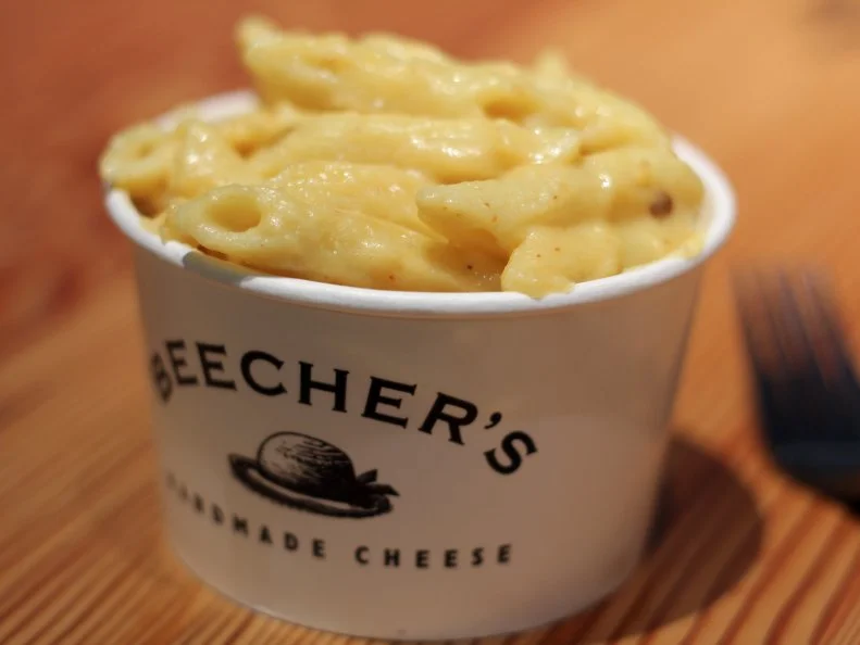 The popularity of this iconic mac comes down to two things: a generous amount of Beecher’s signature Flagship cheese and the fact that there’s no actual macaroni involved. Flagship, Beecher’s signature cheese, melts smooth and creamy, while retaining its nutty, robust flavor. And using penne as the pasta gives the dish a chewier texture and helps hold the sauce better than standard macaroni. The recipe is rounded out with a hint of garlic and chile powder which, according to Beecher’s, makes it the World’s Best.