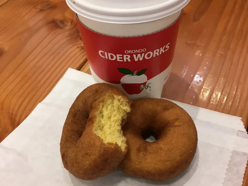 Started in 2003 by Chuck and Sharon Podlich, Orondo Cider Works is their answer to the roadside stands that were abundant when they lived in New England, but oddly enough, not when they moved to Lake Chelan Valley. Not only does Cider Works sell fresh cider direct to consumers, they sell cider doughnuts, which are still a novelty here, despite the abundance of orchards. Because of this, people come in from all over the state for the cider and the doughnuts, made fresh daily from the apples they press and grow themselves.