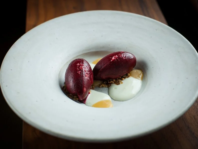 The only peated barley sourced outside of Scotland can be found at one of Seattle’s newest bars, No Anchor, on the dessert menu. Sourced from the Olympic Peninsula peat bogs, the barley is lightly toasted, creating a nice crunch against whatever seasonal sorbet or ice cream is on offer. While the

flavor is muted, especially compared to peated whiskey, the barley lends a nice flavor. Mixed with hard-cracked sugar, the two are blitzed together to create a unique crumble that is hyper specific to Washington.
