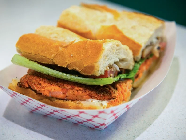 With just a smattering of stools surrounding a large grill smack dab in the middle of bustling Pike Place Market, Market Grill is an unassuming oasis where the locals go for one of the best sandwiches in the city. The salmon sandwich consisting of a simple grilled salmon fillet dressed with aioli, tomatoes, lettuce and onions on a fresh baguette from Le Panier bakery across the street. Everything is sourced from right inside the market. If Seattle could be summed up in a single sandwich, this would be it.