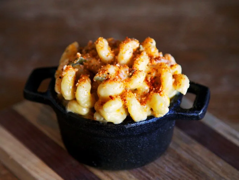 This downtown Bismarck place offers fresh craft cocktails and excellent small plates served in a rustic-chic space. It has something for everyone, including classic Prohibition-era mixed drinks and modern molecular mixology. One thing everyone who visits agrees on, however, is the infamous mac and cheese. It’s one of the only dishes that constantly remains on the rotating seasonal menu. The simple dish is the ideal blend of flavors and textures. It’s smooth and crunchy with smoky and creamy notes, as well as a touch of spice. Swirly, tubular pasta is tossed with a four-cheese blend of smoked Cheddar, white Cheddar, Parmesan and havarti, roasted jalapenos and bacon, and it's topped with a spice panko breadcrumb crust.