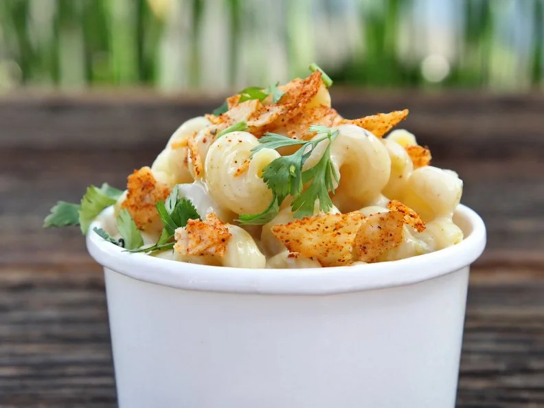Hailing from Scottsdale, Arizona, by way of The Culinary Institute of America, Todd Erickson has brought a unique Southwestern sensibility to South Florida. At his casual Miami Beach taqueria, the executive chef serves a range of inventive Mexican and Southwestern fare, including an impressive mac and queso. It starts with the restaurant’s queso dip (an infamous late-night favorite): a savory blend of sauteed onions, garlic, roasted green chiles, coriander, cumin, oregano, Monterey Jack, Cotija and white melting cheese. That spice-filled cheese blend is tossed with cavatappi pasta, then topped with grated cortina, chopped cilantro and crushed tajin tortilla chips, basically Erickson’s housemade version of Doritos. Pair it with a taco and margarita, then go to bed content. 