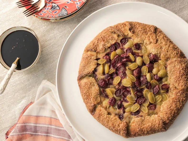 Grape and Ricotta Galette with Fennel Crust and Red Wine Syrup
