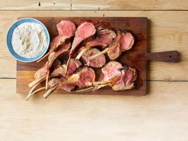 Spice-Rubbed Lamb Rack with Yogurt and Fresh Herbs Recipe | Curtis Stone | Food Network