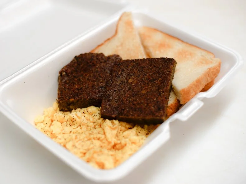 Often derided with a grimace as a mystery mix of cast-off pig parts, this cornmeal-fortified breakfast loaf has a crisp beauty when sliced thin, fried dark-dark brown and slathered with either syrup, ketchup or grape jelly. Properly prepared, scrapple’s savory, soft crunch pairs perfectly with eggs, and has even been known to venture boldly into sandwiches and even onto pizza.  Luckily, this typically home-cooked dish also finds loving treatment at one of the state’s funkiest, most unapologetically unsophisticated diners, in Smyrna at Helen’s Famous Sausage House (where diners should ask to eat in the Elvis Room). It is also available via mail at Rapa Scrapple.