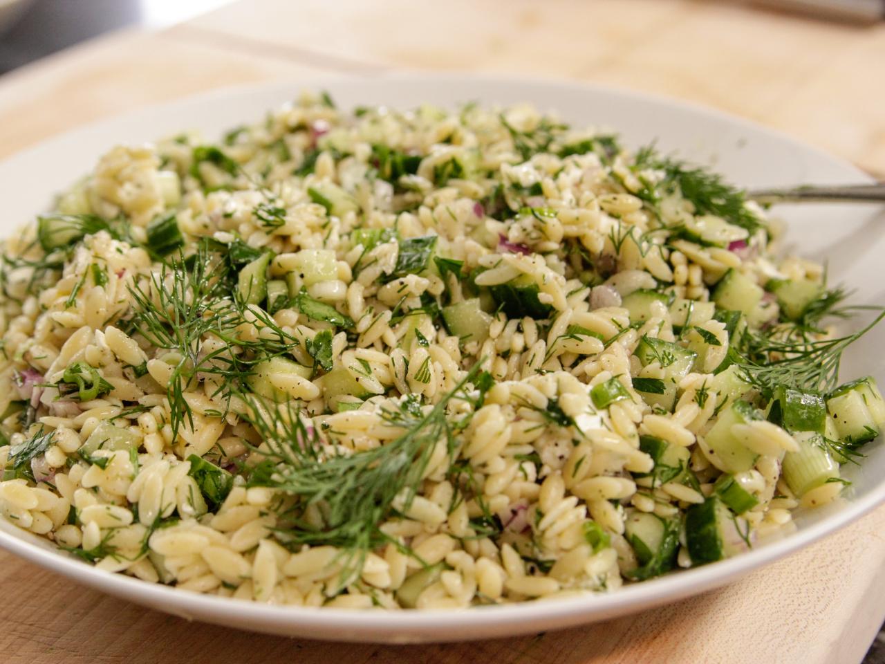 https://food.fnr.sndimg.com/content/dam/images/food/fullset/2017/5/18/0/BX1303H_Herbed-Orzo-with-Feta_s4x3.jpg.rend.hgtvcom.1280.960.suffix/1495125477764.jpeg