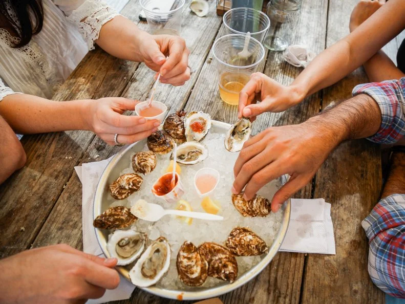 In the early 1800’s, Blue Point oysters were the must-have food for wealthy New Yorkers. Healthy populations of briny mollusks, found off the coast of Blue Point on Long Island’s Great South Bay, were so popular that populations dwindled to near extinction. Now, the term represents bivalves throughout New York and Connecticut, including their sustainable oyster farms. Try oysters from all around Long Island at Little Creek Oyster Farm & Market. Set on the North Fork in Greenport, the market offers one of the largest selections of local oysters in the region, with rotating picks like Summer Blues, Peconic Gold, Shinnecock and Montauk Pearls. Guests can order oysters on the half shell or learn to shuck themselves — the staff will provide a glove and a quick tutorial.