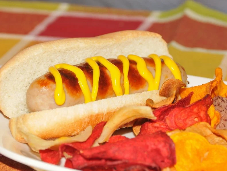 German immigrants may have introduced hot dogs to the US, but Americans have turned the tubular meat into an edible icon. There are cleverly adapted regional spins all throughout the country; in Central and Western New York, the Rochester white hot rules. The frank is a combination of unsmoked, uncured pork, beef and veal, in a natural casing. The best-known producer is Zweigle’s, and the top place to try one is Schaller’s Drive-In in Rochester. Open since 1956, the retro lakeside stop seems to have changed little in the decades since. Their classic white hot preparation is topped with the usuals, including meat-based “hot sauce,” mustard and onions.