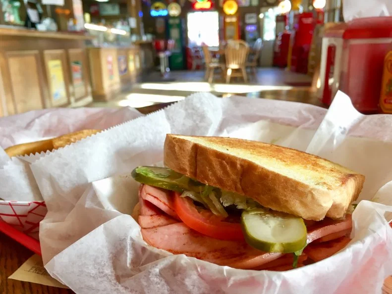 This homey sandwich — a mainstay of childhood lunches and late-night diners — gained celebrity when Indianapolis native and longtime talk show host David Letterman would discuss it on-air, famously calling his mother, Dorothy, for the recipe. There’s really not much to it. The classic sandwich just features sliced, pan-fried deli bologna on white bread. Cammack Station, a retro restaurant in Muncie, where Letterman attended college at Ball State University, serves an excellent example.