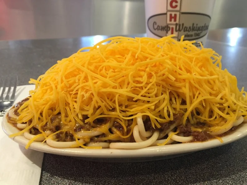 Thanks to Skyline Chili, scores of Americans living outside the Queen City have discovered the matchless joys of Cincinnati-style chili, which fans know has little to do with that Texas-reared version. At countless “parlors” throughout the region, chili refers to that thin, mildly spiced meat-based sauce that is ladled over Coney dogs or big platters of spaghetti. Skyline and early rival Gold Star both cast a very wide net throughout the region and beyond, but many locals prefer to get their two-, three-, four- and five-way plates at local legend Camp Washington, honored by the James Beard Foundation as an American Regional Classic. Whether you prefer yours topped simply with finely shredded cheddar cheese or the works — cheese, onions and beans — it’s a comfort classic, best enjoyed with hot sauce and oyster crackers.