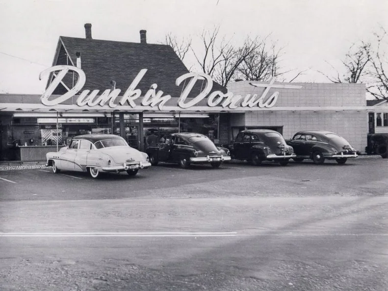 Massachusetts loves its Dunkinâ   Donuts, which is fitting, since itâ  s the chainâ  s home state. But it didnâ  t always have that clever alliterative name. The shop was known as Open Kettle when it opened in Quincy in 1948. It was not until 1950, when Owner Bill Rosenberg sought a catchier name, that he renamed the doughnut restaurant. While you wonâ  t see vintage pricing â   a dozen donuts were just 69 cents in 1950 â   you can still visit the original shop with the brandâ  s initial cursive signage, doughnut-topped tables and a question mark-shaped counter.