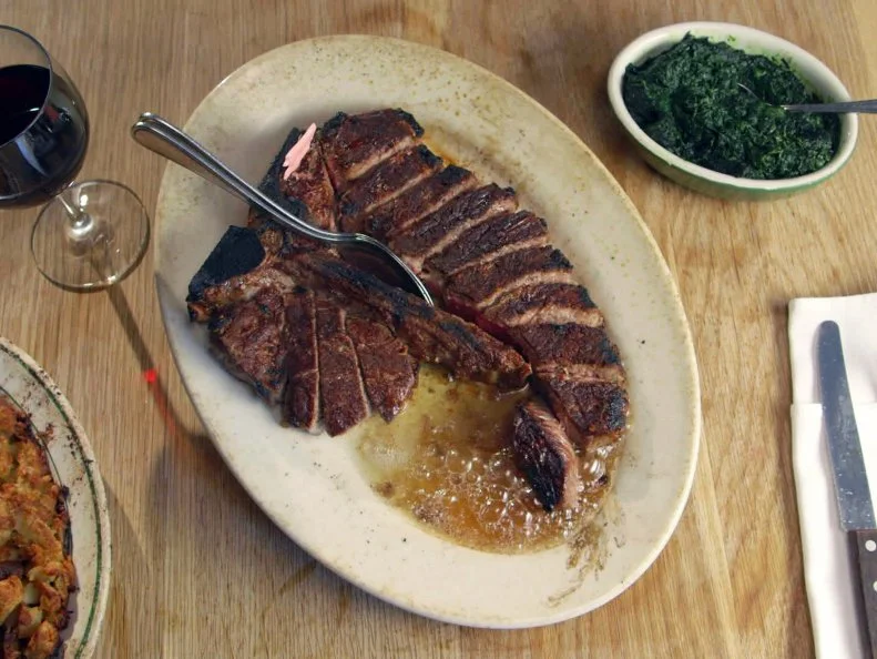This Brooklyn steakhouse, in operation since 1887, is often brimming with large tables filled with men, yet it is the women who rule what goes on behind the scenes at this classic institution. First established as Carl Luger's CafÃ©, Billiards and Bowling Alley by owner Peter Luger, the restaurant was purchased at auction by Sol Forman in 1950 after Luger died and the restaurant fell into disrepair. Forman, who ran a family flatware business across the street, previously entertained clients there and knew the critical piece of preparing a great steak was how the meat was sourced. Reportedly wearing a fur hat and white lab coat, his wife, Marsha, studied proper selection for two years under a former U.S. Department of Agriculture inspector, spending hours in the plants in the gritty Meatpacking District. To this day the Forman women, led by Sol's granddaughter Jody Storch, handpick only the finest USDA prime cuts, which are then dry-aged in-house.