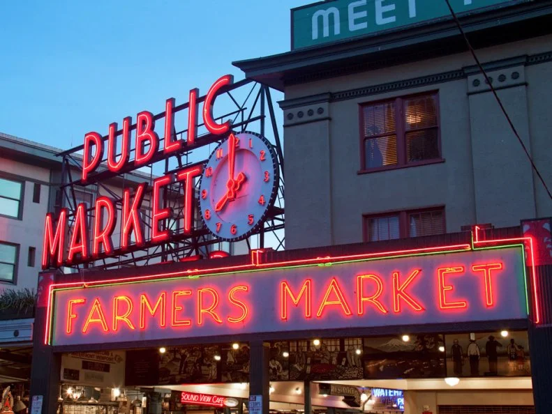 With the city's population nearly doubling at the turn of the century, so increased the demand for food. Local farmers seized the opportunity to capitalize on this population surge by price gouging, which did not make Seattle folks too happy. A center for fair trade was proposed and, on Aug. 17, 1907, the Pike Place Market was born. Shortly thereafter the market went from a collection of 70 vendors on a wooden roadway to a brick-and-mortar structure with the glorious arcades that still stand today. It is also here, at 102 Pike St, where the original Starbucks opened in 1971. Listed on the National Register of Historic Places, this culinary hub continues to expand, most recently in 2015.