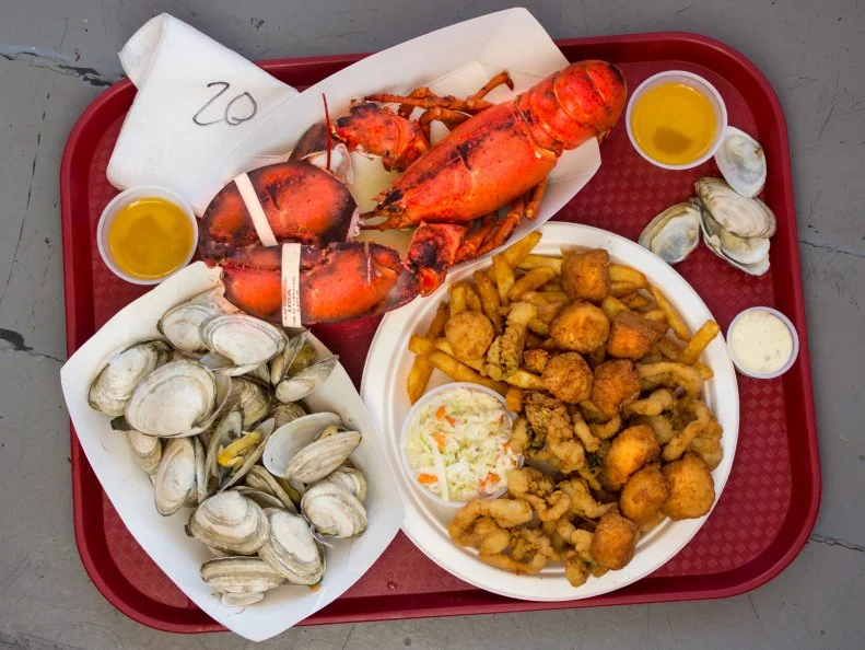 The New Hampshire seafood shack scene is not to be missed. Typically, you’ll find rows of picnic tables in a large room, with diners up to their elbows in lobster shells, steamers, drawn butter, with an occasional stray French fry. Lobsters pulled from a tank and dunked into a steaming iron caldron of salted water can be the main choice, but steamers and fries make it a meal. Enjoy some of the best there is at the casual, cash-only Brown’s Lobster Pound in Seabrook.