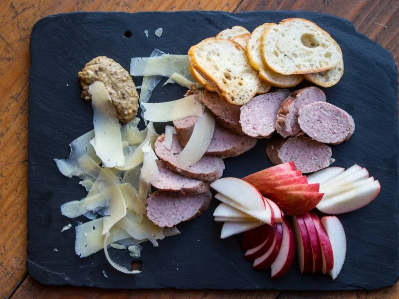 The whole menu at Throwback Brewery in North Hampton is intriguing and geared to pair with their generous list of stouts, porters and lagers on tap, but one special treat is the sausage made by co-founder Nicole Carrier. She recently added charcuterie to her list of talents, using the same commitment to historic methods that earned her such a strong reputation in brewing. Autumn sausage on the charcuterie plate, a kielbasa and even the chorizo in the steamed mussels are all house-made.