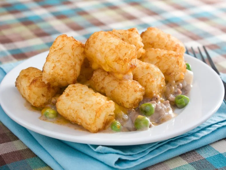 Hearty, filling and unpretentious, tater tot hotdish is North Dakota comfort food at its finest. In the Midwest, baking pretty much any combination of starch (like potatoes, rice or pasta), protein (think tuna or ground beef) and sauce together counts as a hotdish — called a casserole in other parts of the country — but this rich and satisfying variation is a local favorite. The Boiler Room in Fargo ups the ante for the stick-to-your-ribs meal that Mom used to make up, combining savory sausage gravy, bacon, caramelized onions, three different cheeses and house-made tots. 