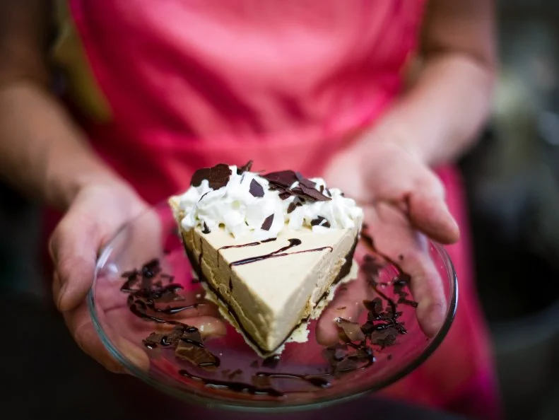 Wisdom, a spit of a town in the heart of Montana’s Big Hole Valley, is home to The Crossing Bar & Grill at Fetty's and some of the best pie under The Big Sky. Clad in a crisp, hot pink vintage apron, Diane Havig — who owns the business with her husband, Dennis — greets customers with a rolling pin as she perfects crusts on lattice-topped apple pies, huckleberry-blueberry pies, sour cream raisin, chocolate-bottom peanut butter, rhubarb and buttermilk cream pies — so many glorious types of fresh homemade pies that the dining room chalkboard barely squeezes in the list.