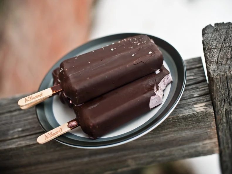 Wilcoxson’s Ice Cream is as much a Montana dietary staple as a hearty steak or a juicy hamburger. Boasting 58 flavors, including local strongholds Bobcat Batter and Chocolate Runs Through It, the Livingston-based company has been filling bellies throughout Big Sky Country since 1912. Sandwich shops like The Pickle Barrel (in Bozeman, Belgrade, Livingston and Billings) whip Wilcoxson’s into milkshakes or serve it in softball-size scoops on cones. Wilcoxson’s Huckleberry Ice Cream Bars can be snapped up at most any grocery story, gas station or hardware store between Yellowstone and Glacier with a “Proudly Serving Wilcoxson’s” sign displayed in the front window.