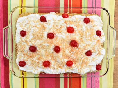 A Pina Colada poke cake, as seen on Food Network's The Kitchen.