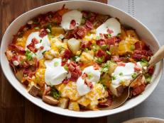 This casserole combines all the irresistible features of a loaded spud, but is cooked and served family style for an extra-hearty side.