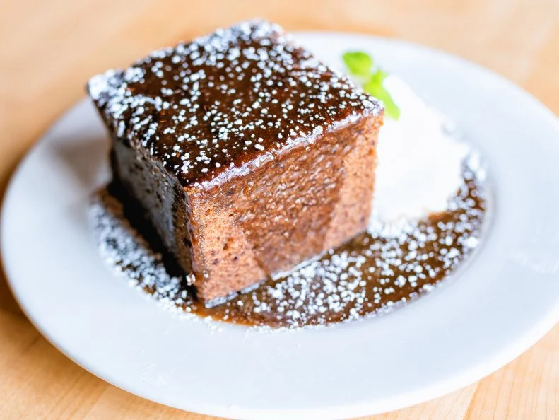 When your dessert comes out on a dinner plate and not only looks like a brick, but nearly weighs as much as one, you know you’ve ordered correctly. Schlafly’s sticky toffee pudding — STP for short — has been on the menu since day one. The cake, made with a hefty amount of dates, is topped with a caramel toffee sauce and served with a dollop of freshly whipped cream. Pair it with a coffee stout for the full Schlafly experience.