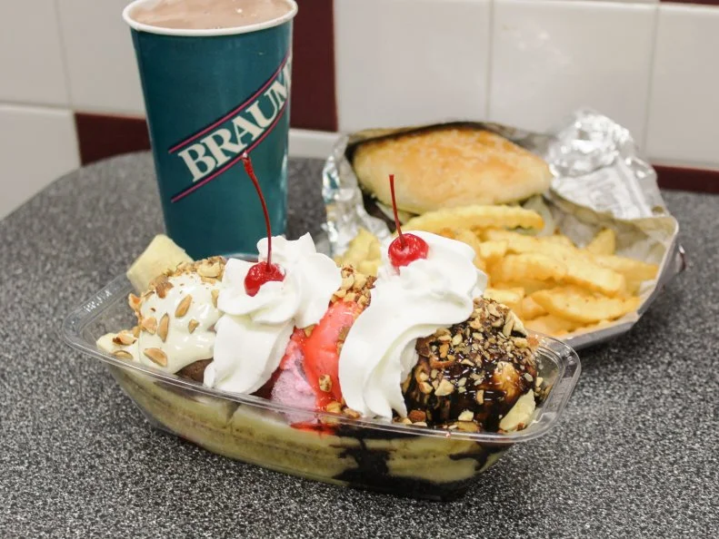 Emporia, Kansas, dairy farmer Henry H. Braum made it through the Depression well enough to open a chain of ice cream stores called Peter Pan. He sold the company to his son Bill in 1957. Bill expanded Peter Pan and sold it in 1967, promising not to compete in Kansas for a decade. So, he moved the family to Tuttle, Oklahoma, and opened the first Braum’s in 1968. Today the company has close to 300 franchises throught the region, including Kansas, Texas, Missouri and Arkansas. No longer just ice cream parlors, Braum’s serves burgers that have become quite popular.