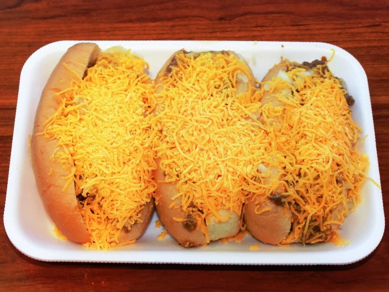 Despite the 1,400-mile distance, Tulsa shares a connection to Coney Island in the form of hot dogs. Back in 1926, Greek immigrant Christ Economou opened his first Coney Island-inspired stand downtown. Today, coneys are as popular as ever at seven Coney I-Lander locations and Jim’s Coney Island. Oklahoma City boasts a pair of Coney Island restaurants owned by Greek families, too. The signature dish at all of them is a slow-grilled frank topped with Greek chili, onions, cheese and mustard in a steamed bun.