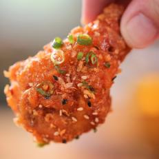 Forking An Asian Sticky Wing as served at Alkaline in Norfolk, Virginia as seen on Food Network's Diners, Drive-Ins and Dives episode 2701.