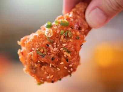 Forking An Asian Sticky Wing as served at Alkaline in Norfolk, Virginia as seen on Food Network's Diners, Drive-Ins and Dives episode 2701.
