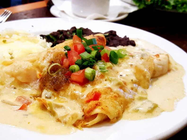 This venerated mainstay began in 1986 on the edge of a growing capital city. Today, Trio’s is miles from the western edge of town, but it’s still the restaurant by which all other midrange eateries in Little Rock are judged. Chef Capi Peck, whose family has been at the heart of the city’s restaurant scene since the 1930s, works with partner Brent Peterson to cultivate a menu defining Little Rock food culture – from the legacy Peck Salad to the much-lauded raspberry cream pie to the adored shrimp enchiladas, one of many dishes combining Latin influences with Arkavore cuisine.