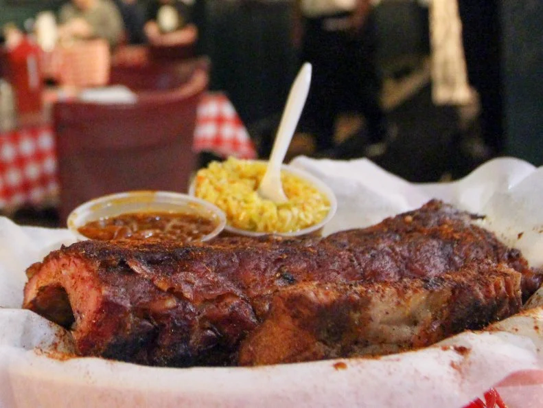 A brotherly argument over a meat-and-three restaurant called Wimpy’s started this back-alley barbecue basement in 1948. Originally opened as a beer-and-ham-sandwich joint, the Rendezvous quickly gained renown for its dry-rub ribs. Mr. Charlie’s coal-chute smoker still flavors the air near the Peabody Hotel, and you’ll find the interior packed with individuals visiting from all over the world.