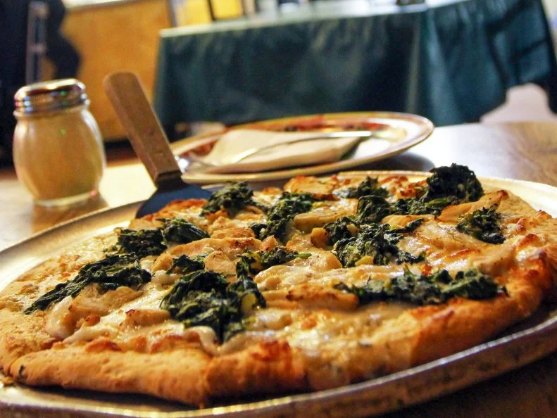 A local hotspot which draws loyal University of Memphis alumni long after they’ve graduated, this old-school pizza joint delivers on hand-tossed pies served with a variety of toppings. Step back into the 1980s (or earlier) and experience a place where you can still bust a score on Ms. Pac-Man, share slices of good pie on paper plates and sing along to Purple Rain with everyone else in the restaurant.