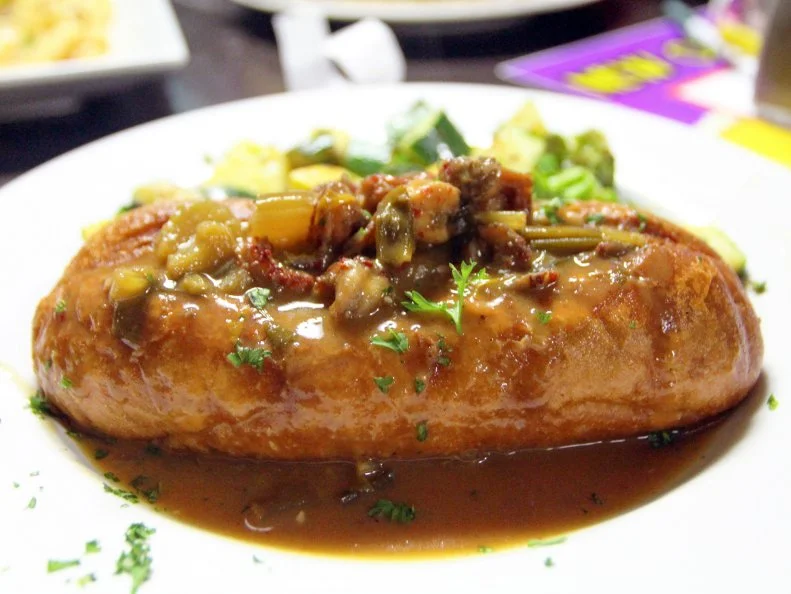 Louisiana transplant Penny Henderson opened this café across from Crosstown Concourse in 2008, after co-workers went nuts over her gumbo. The Lake Charles lady and her extended family now lure adoring fans of their recreated flavors of southern Louisiana, including po’boys, seafood, pasta and crawfish Etouffee – which can be served over rice or stuffed into a bread bowl. Try the red velvet cheesecake to finish.