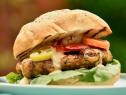 A chicken burger on a Kaiser roll, as seen on Food Network's The Kitchen.