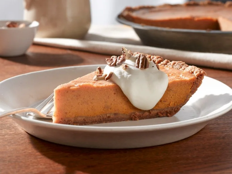 North Carolina is the top U.S. producer of sweet potatoes, so it’s only natural you’d find the best pie here, too. The old tobacco town of Winston-Salem is now home to a modern arts district, a flourishing area that chefs Stephanie Tyson and Vivián Joiner chose as the locale for Sweet Potatoes, their restaurant. Guests who tuck in to lunch, brunch and dinner plates know to save room for dessert. Here, that means the unparalleled pie that begins with a flaky crust and a layer of candied sweet potatoes, topped with a layer of mashed sweet potatoes that’s baked before a finishing layer of whipped cream.