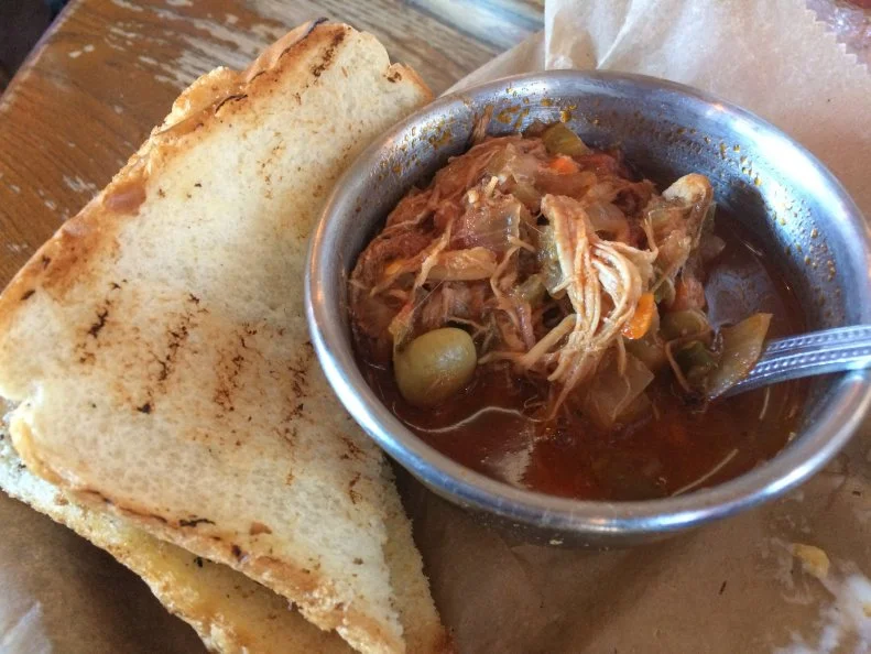 Both Virginia and South Carolina trumpet Brunswick Stew, but North Carolina also boldly lays claim to this thick preparation of tomatoes, lima beans, potatoes and meat. It’s an old dish believed to have been developed by European immigrants. Admittedly, the stew is typically plays a supporting role to barbecue at the family-owned White Swan in Smithfield, where it’s served as a side item. It doesn’t have to be that way: A bowl is satisfying enough to stand as a meal on its own.