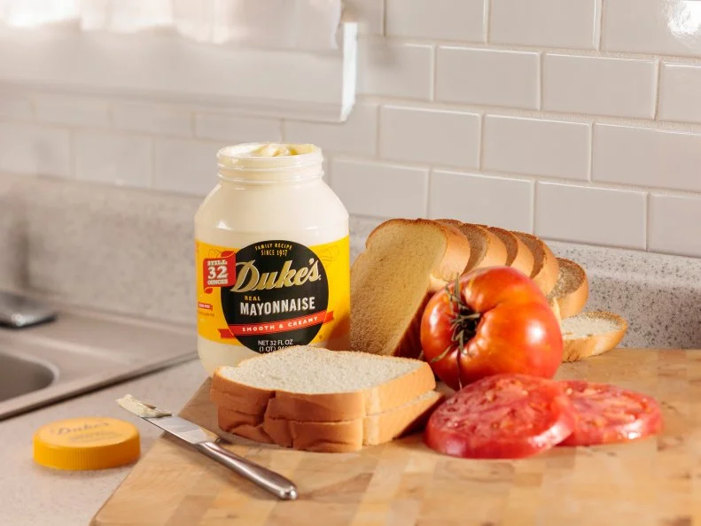 Founded by Eugenia Duke while feeding allied soldiers at Greenville’s Camp Sevier in 1917, Duke’s Mayonnaise has become the condiment of the South. Many battles have ensued between chefs and home cooks alike on which mayo reigns supreme, but the clear winner in South Carolina is the smooth, creamy, slightly tangy, sugar-free spread with the familiar yellow label. Although only the third-largest brand in the U.S., Duke’s Mayonnaise is used by chefs throughout the state in classic dishes like deviled eggs, pimento cheese, potato salad, chocolate cake and the perennial tomato sandwich.