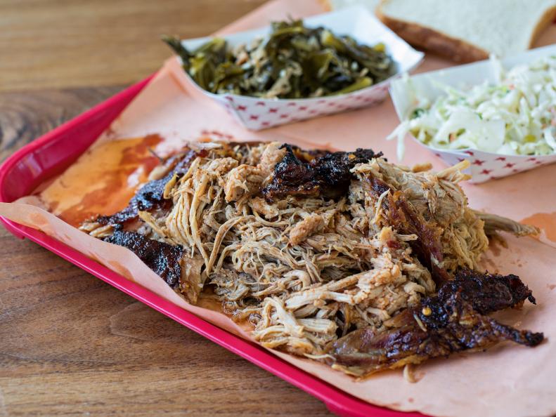 Barbecue, BBQ or Bar-B-Que, no matter how you spell it, ’cue in South Carolina is a religion. Whether you go whole hog (Scott’s Bar-B-Que in Hemingway and Rodney Scott’s BBQ in Charleston are king), pork butts (Carolina Bar-B-Que in New Ellenton has been smoking theirs since 1968), ribs (Henry’s Smokehouse in Simpsonville slow-roasts their St. Louis-style sticks for six hours), or an all-you-can-eat buffet with a wide variety, you can find them all on the South Carolina Barbecue Trail. And don’t even start on the tomato, mustard, or vinegar sauce wars.