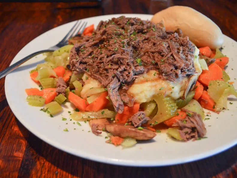 All that Kansas cattle means plenty of pot roasts. Hearty enough to stave off bitter winter chills, it’s long been a local favorite. Just outside of Kansas City, at O’Neill’s Restaurant, the Irish Pot Roast is filling and flavorful. A mound of mashed potatoes is covered with tender shredded pot roast cooked with mushrooms, then topped with a cabernet sauce. The pile is surrounded with sautéed celery and carrots to make it as nostalgic and homey as possible.