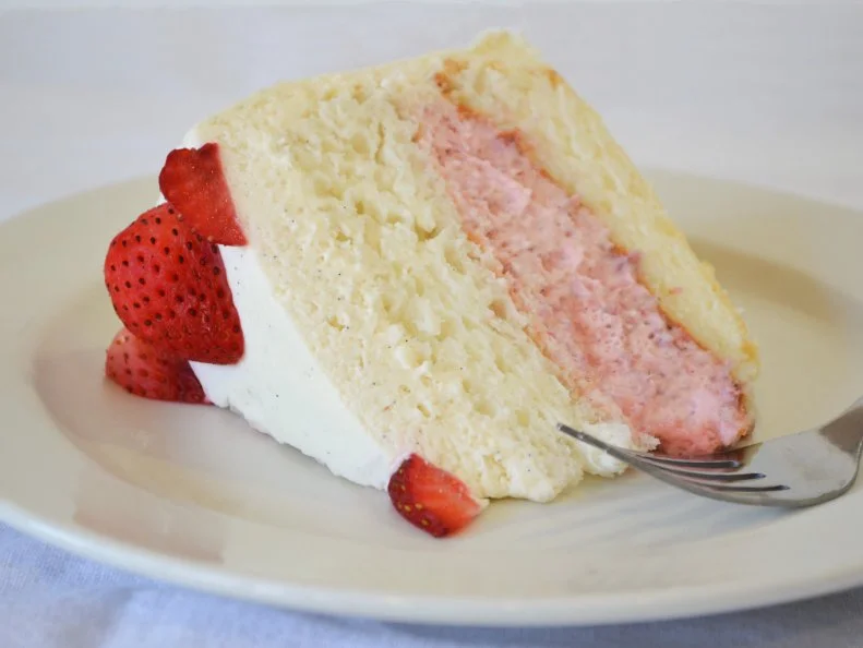 Go to any Kansas celebration, pot-luck or friendly gathering, and you’re likely to find cake. Some of the best can be had at The Kitchen in Wichita. Owner Natasha Gandhi-Rue’s husband, Scott, is a construction guy by day and a pastry chef by night, creating rich, luscious cakes that would please any sweets connoisseur. His strawberry version features a cake that is a combo genoise sponge and angel food. The strawberry mousse layer folds whipped cream and cream cheese together with both pureed and diced strawberries, and everything is topped with a vanilla bean cream cheese and whipped cream frosting.