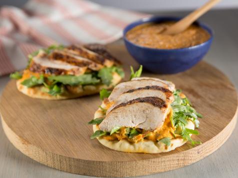 Spice-Rubbed Chicken Breast on Toasted Pita with Piquillo-White Bean Hummus and Arugula Salad
