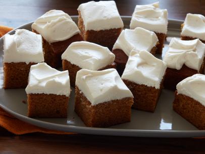 Food Network Kitchen’s Spiced Pumpkin Bars with Cream Cheese Icing.