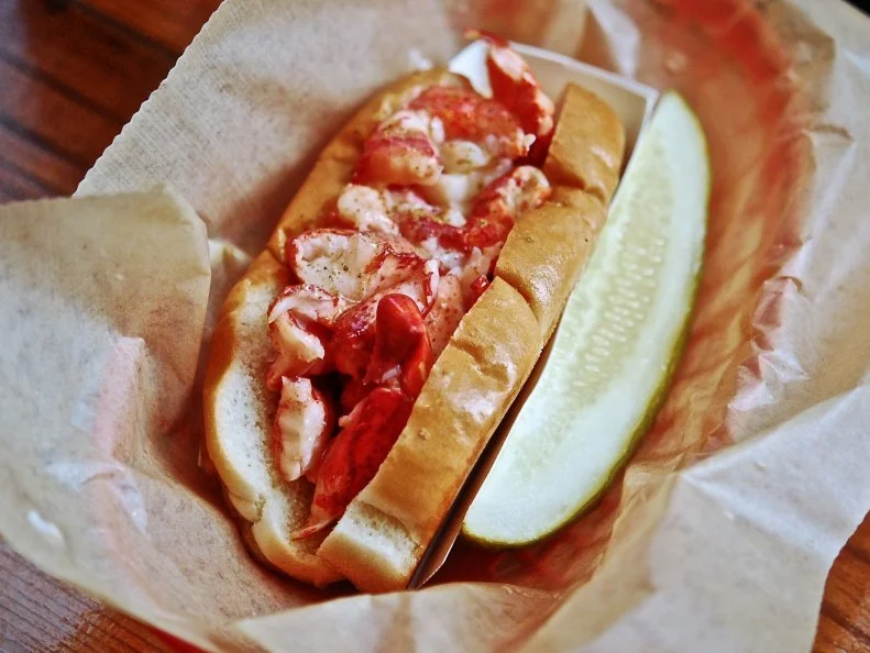 The absence of authentic Maine-style lobster rolls in New York City inspired native Mainer (and son of a former lobsterman) Luke Holden to set up shop in 2009. What started as an eight-stool space styled after a traditional lobster shack has grown into a mini-empire with outposts throughout the United States and Japan. Each toasted bun (split-top, of course) comes loaded with a quarter-pound of lobster meat that’s sustainably sourced and processed at a sister facility in Maine. The natural sweetness of the lobster shines through in every bite, balanced simply with a squirt of mayo, slick of lemon butter and sprinkling of seasoning. 