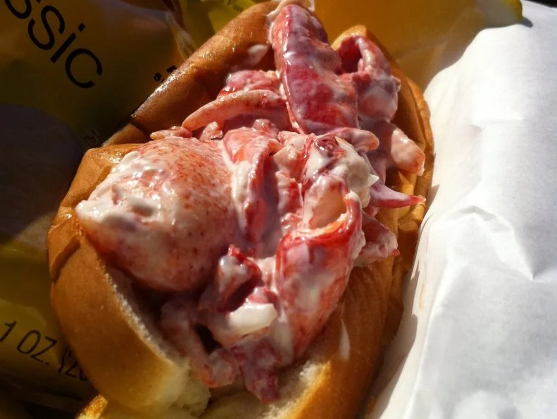A seafood truck in the middle of the Arizona desert may seem like a mirage, but the demand for Diane Santospago’s lobster rolls is no illusion. The Maine native has reeled in legions of loyal fans who will stand in line for hours to snap up one of her sandwiches. Santospago makes few alterations to the flavor of her fresh Maine lobster, serving the meat just “lightly dressed with lemon mayo,” she says. Authenticity is key, so Santospago uses a New England-style roll as the base, which she butters and grills before piling on luscious chunks of lobster. She describes the resulting roll as “Maine on a bun.” When not slinging lobster rolls and other specialties at her seasonal food truck in Arizona, Santospago trades in her wheels for waves, returning to Maine every year for the warmer months. It’s there that Santospago has spent many a season helping to haul lobster traps. Maine lobster lady, indeed.